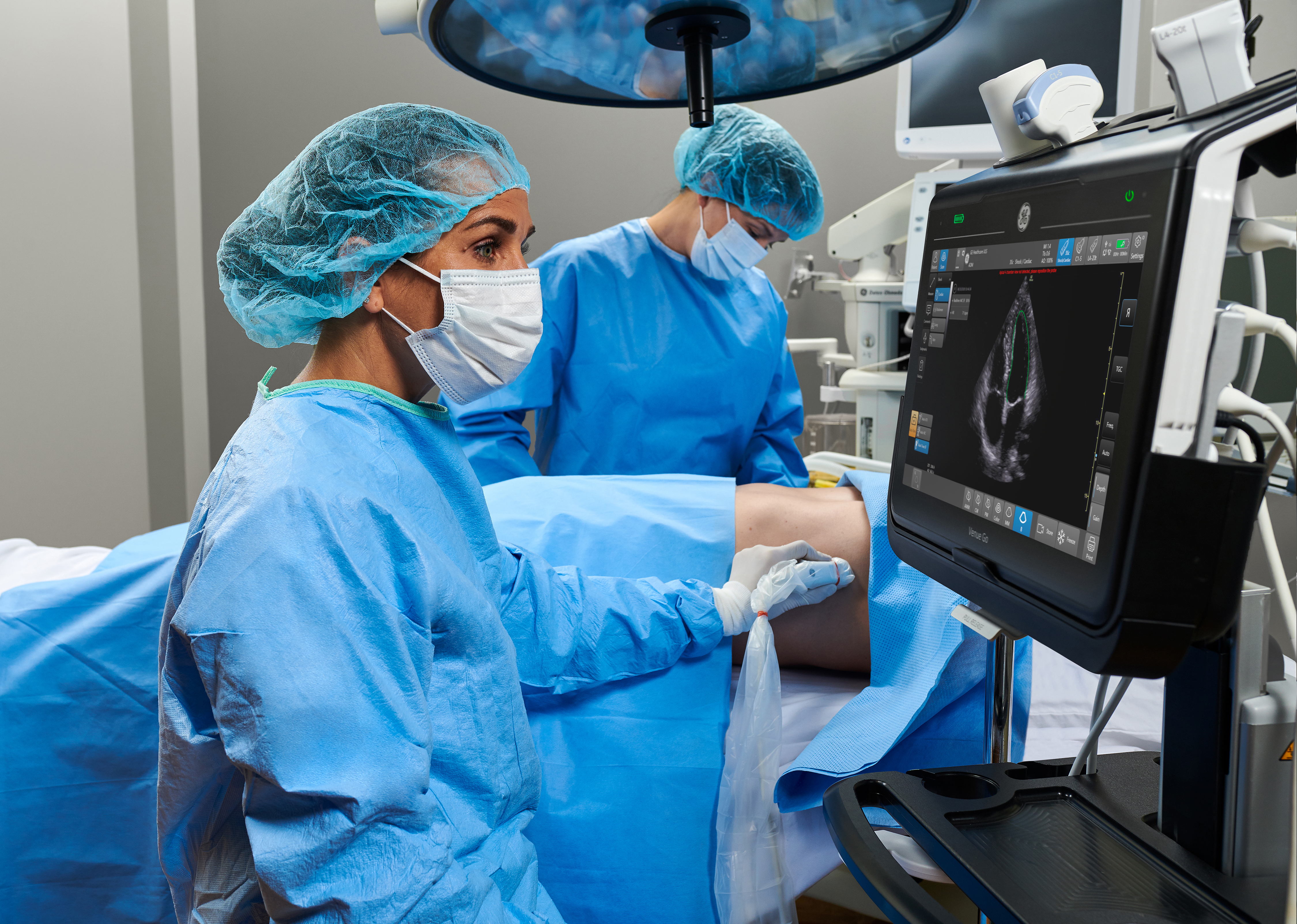 Medical professional reviewing ultrasound