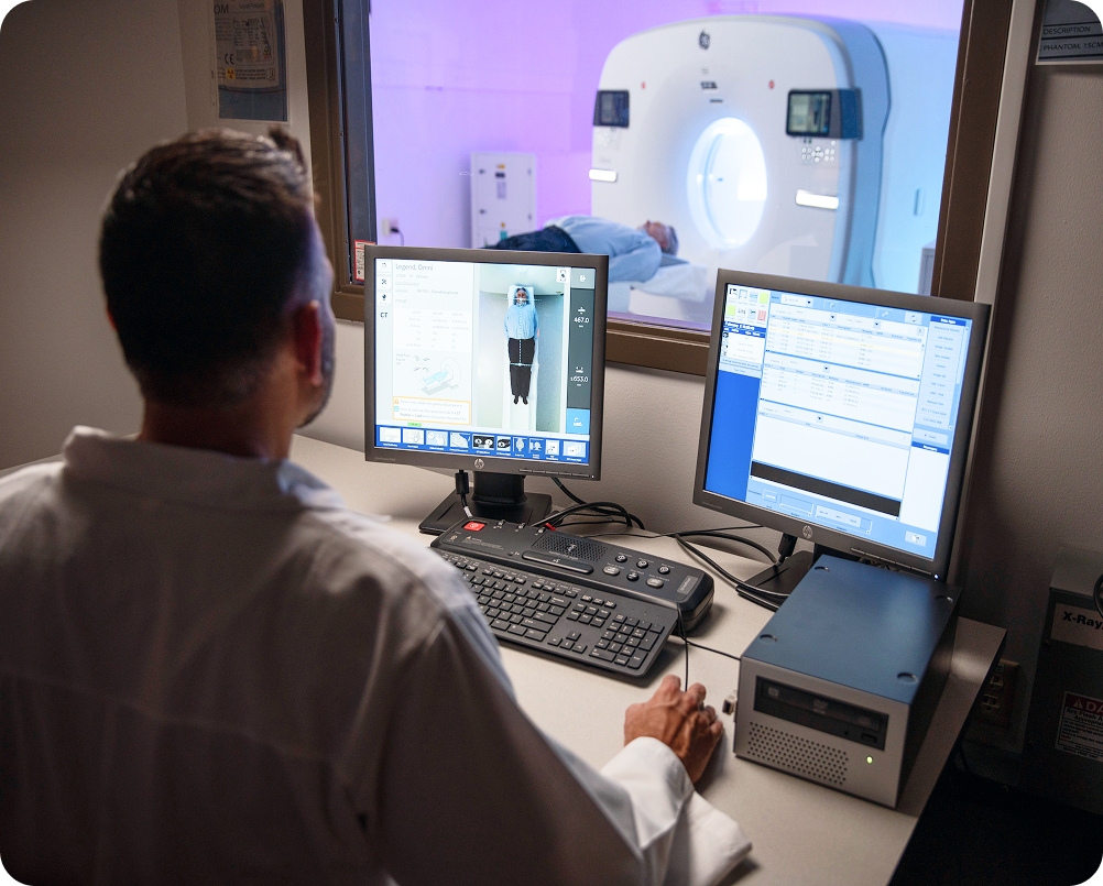 Medical professional scanning patient