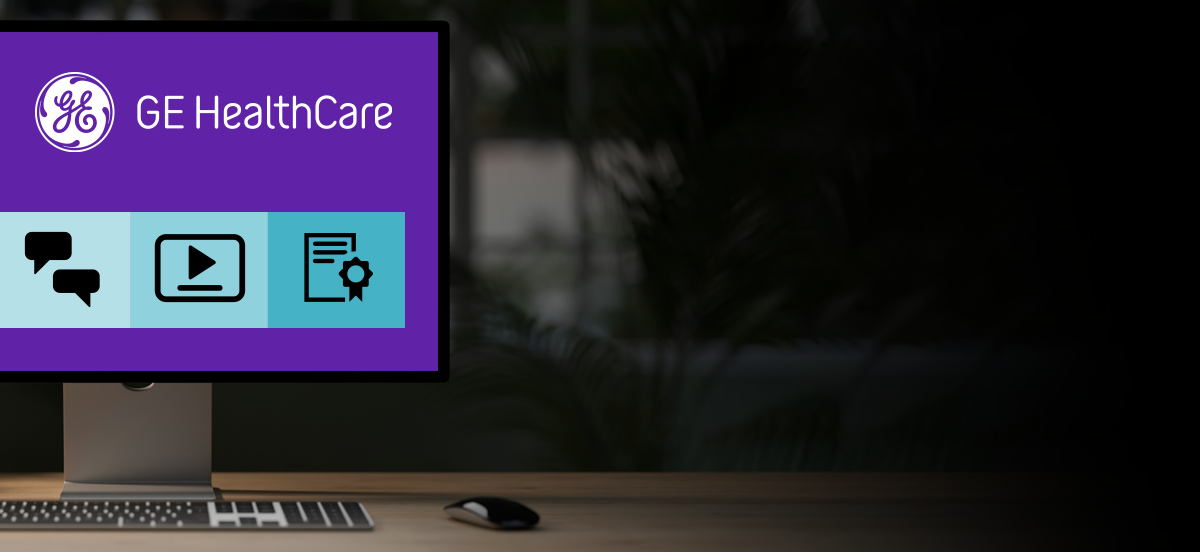 Header illustration of a computer monitor with the GE HealthCare logo on a desk.