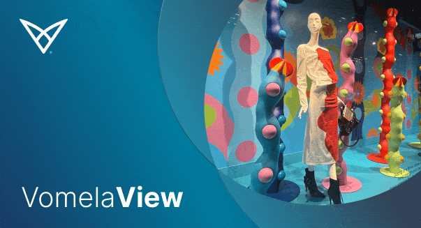 VomelaView logo with a blue and purple gradient background and a concentric circle design.