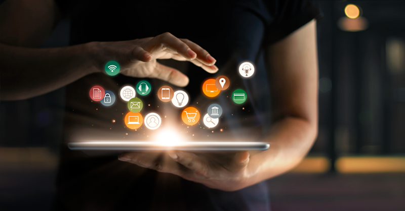 techy icons hovering over tablet