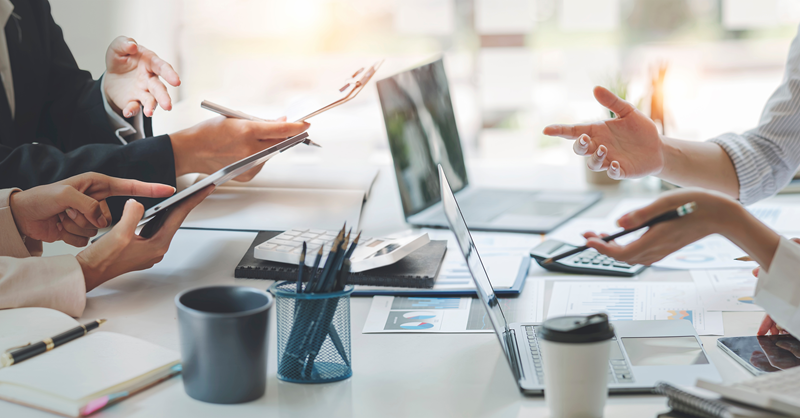 employees working together at a desk