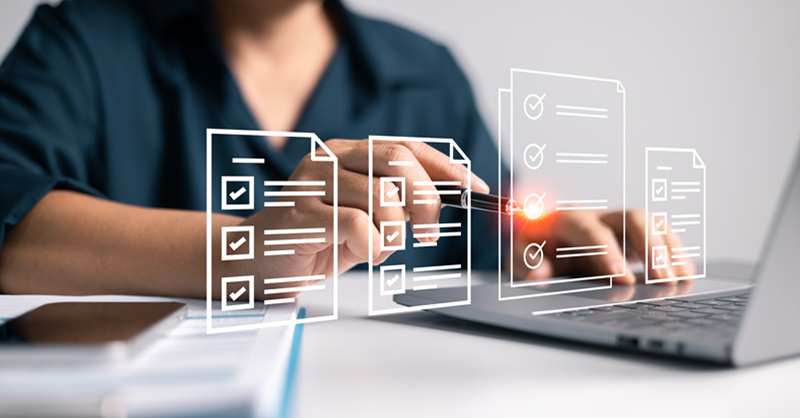 Person typing on laptop