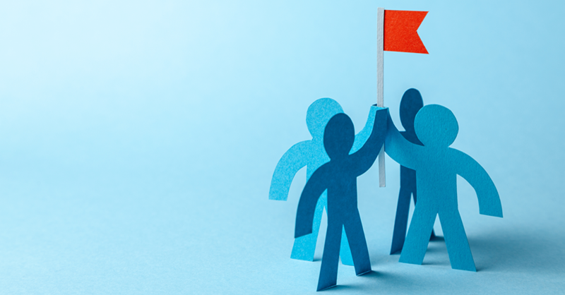 cartoon people holding up flag