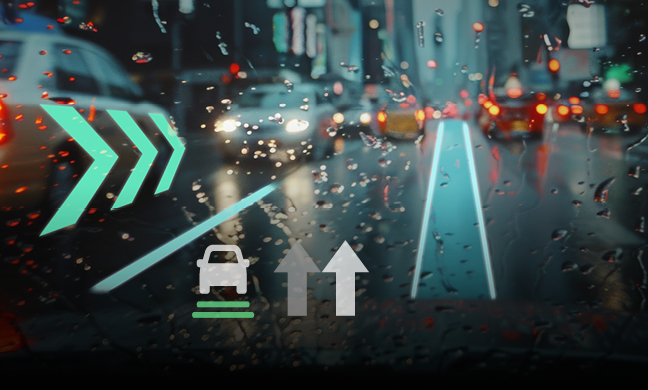 View from a car's interior on a rainy night, with driver-assist graphics overlaid on the wet windshield, indicating a turn, a car ahead, and lane guidance.