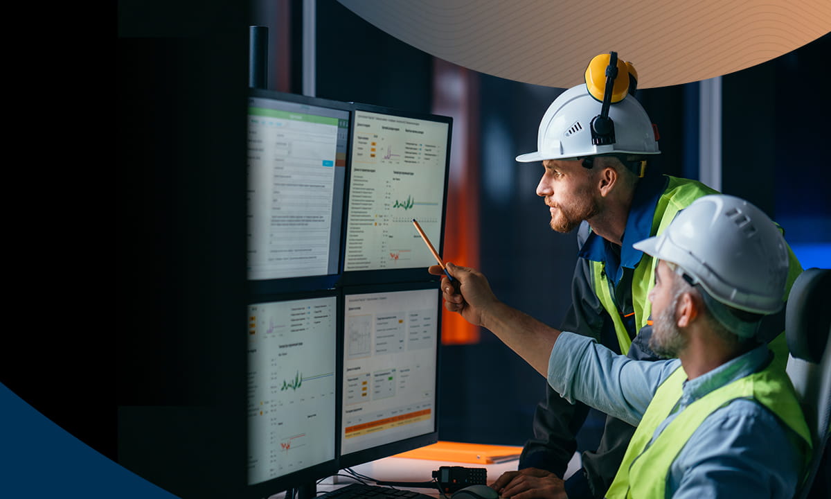 Two people looking at estimating software on a computer screen