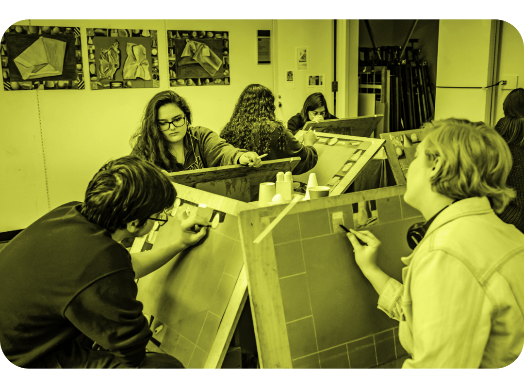 Students working in art studio.