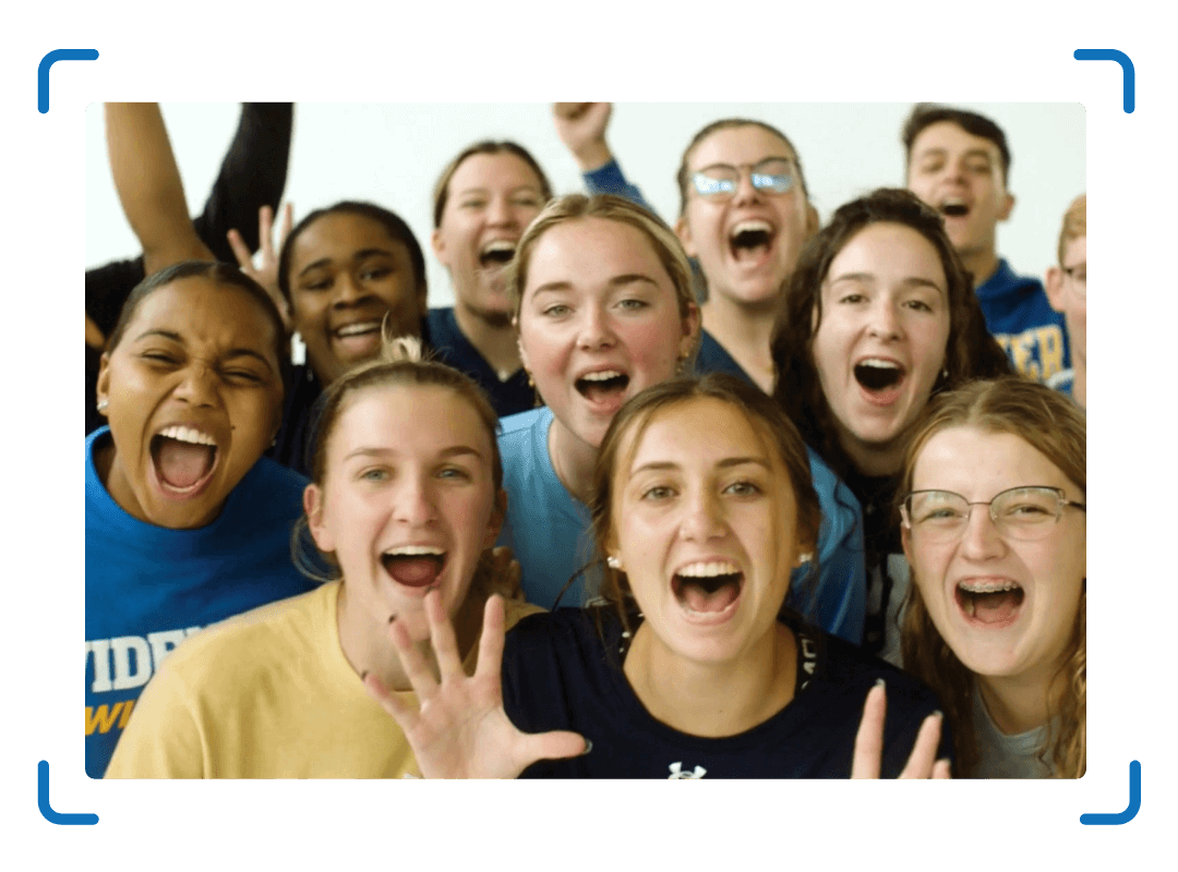 Group of students roaring.
