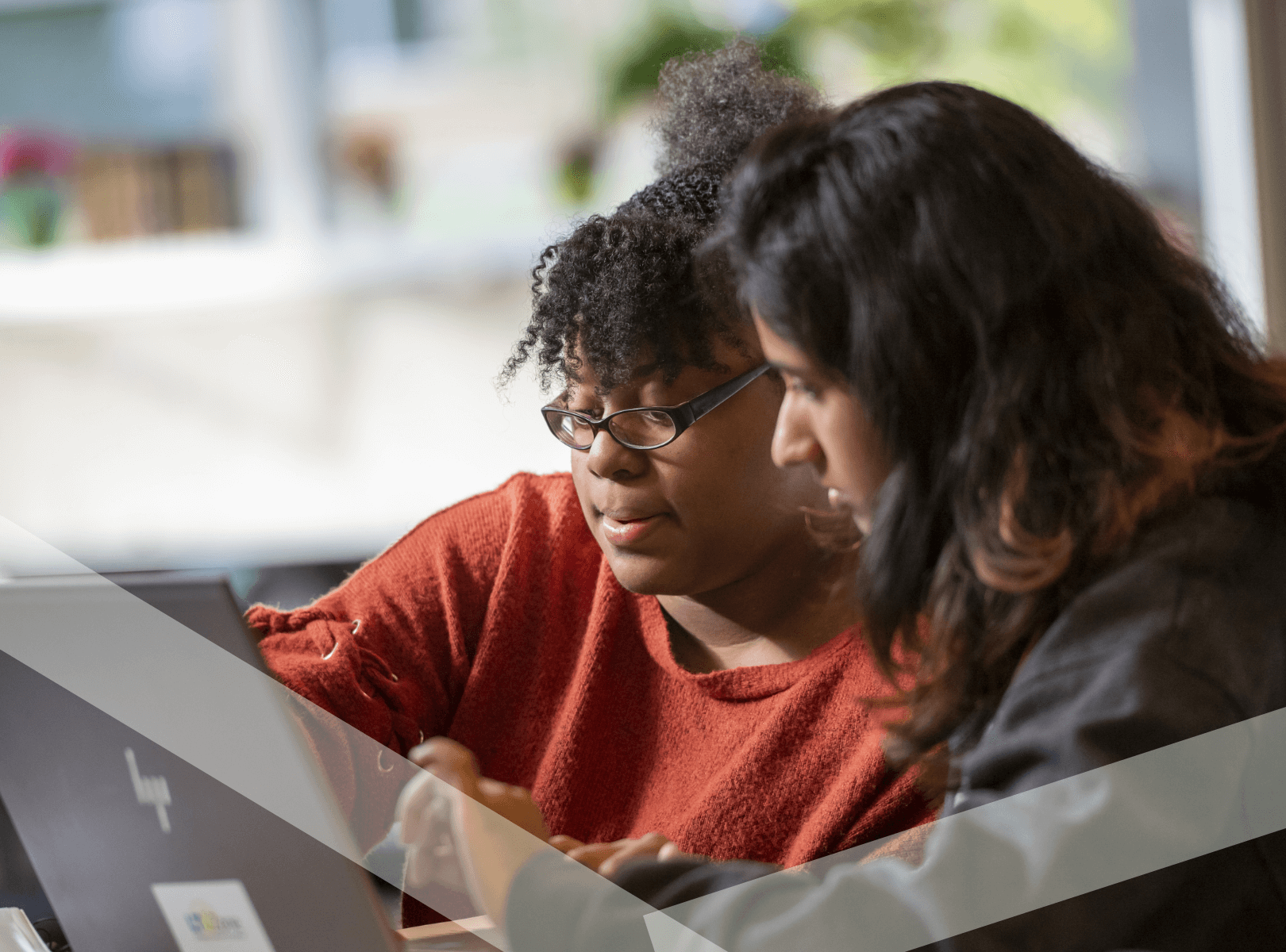 Students working on laptops.