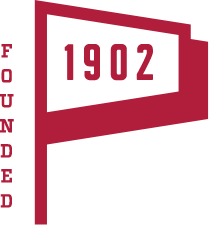Flag icon that reads "Founded 1902"
