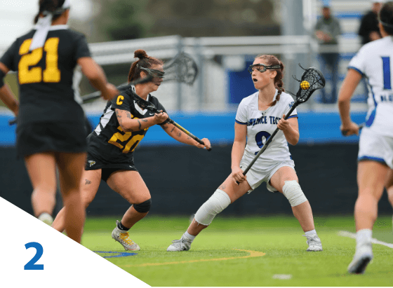 Students playing lacrosse