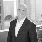 Robbie Traube headshot, President and Chief Customer Officer