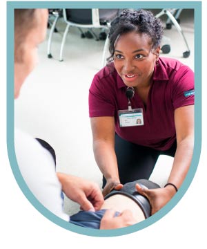 Medical professional demonstrating a healthcare technique.