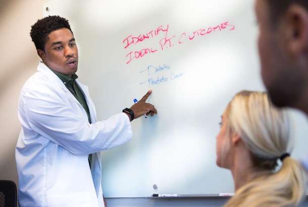 A student leads a medical discussion.