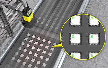 A Cognex barcode scanner reads small direct-part marks on automotive electrical components