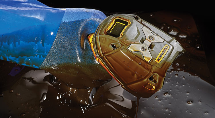 Cognex handheld reader covered in oil