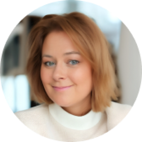 Headshot of a man in a suit and tie.